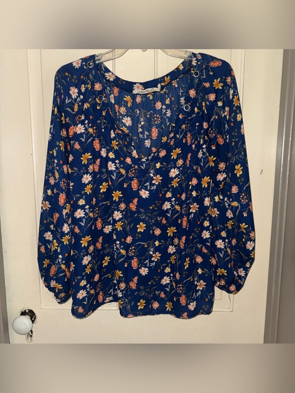 Liberty Love Navy Floral V-Neck Blouse with Grommet Detail
